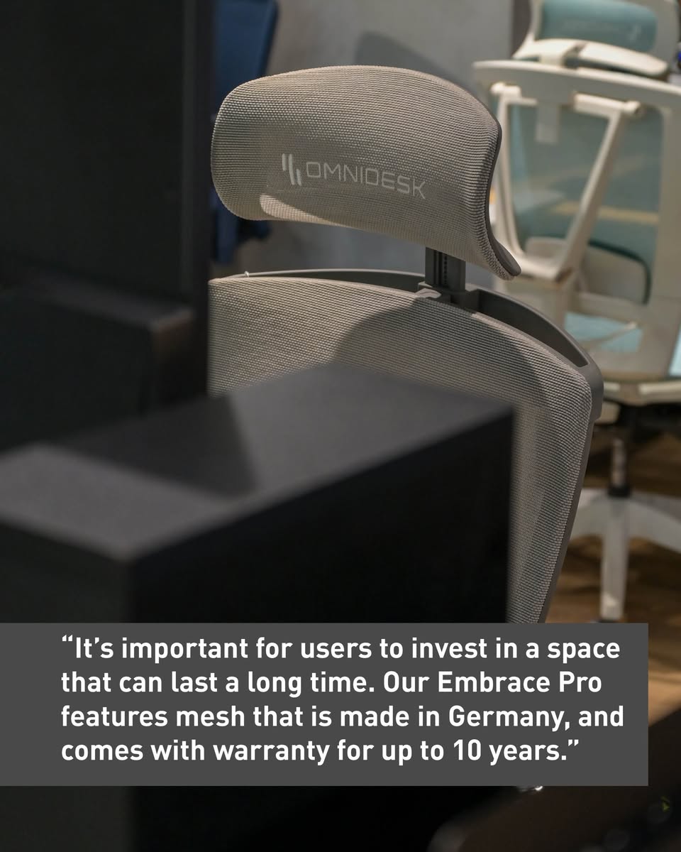 A computer monitor positioned at eye level on a desk.