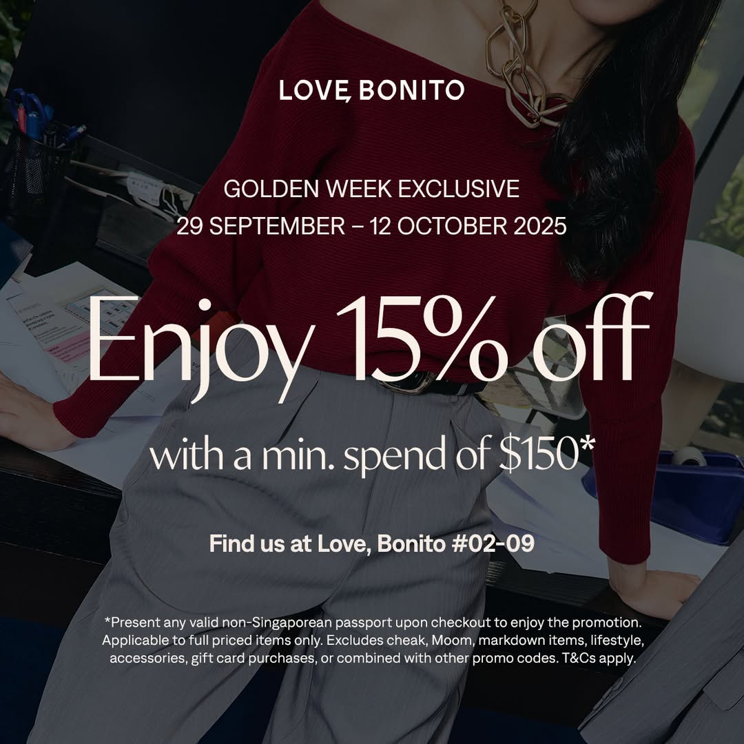 A stylish woman browsing clothing racks at Love, Bonito Funan.