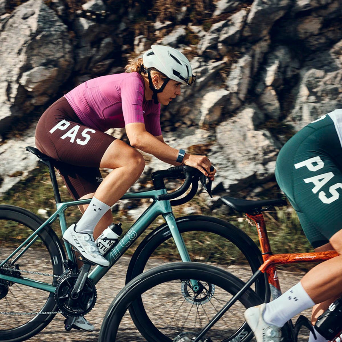 Cyclists preparing for an early morning social ride with Pas Normal Studios