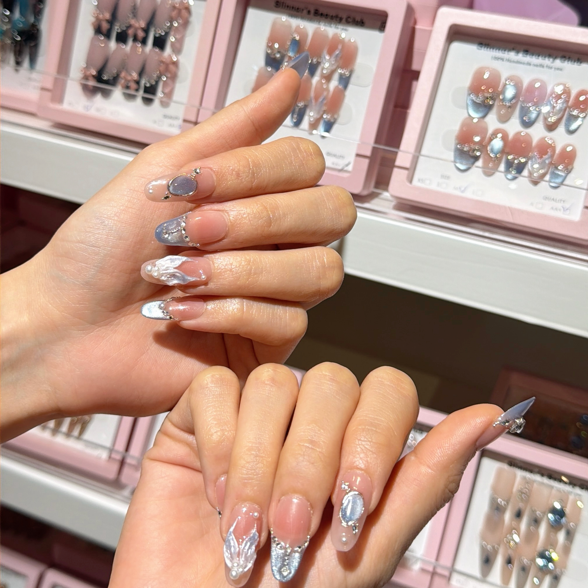 A variety of stylish gel press-on nail designs.